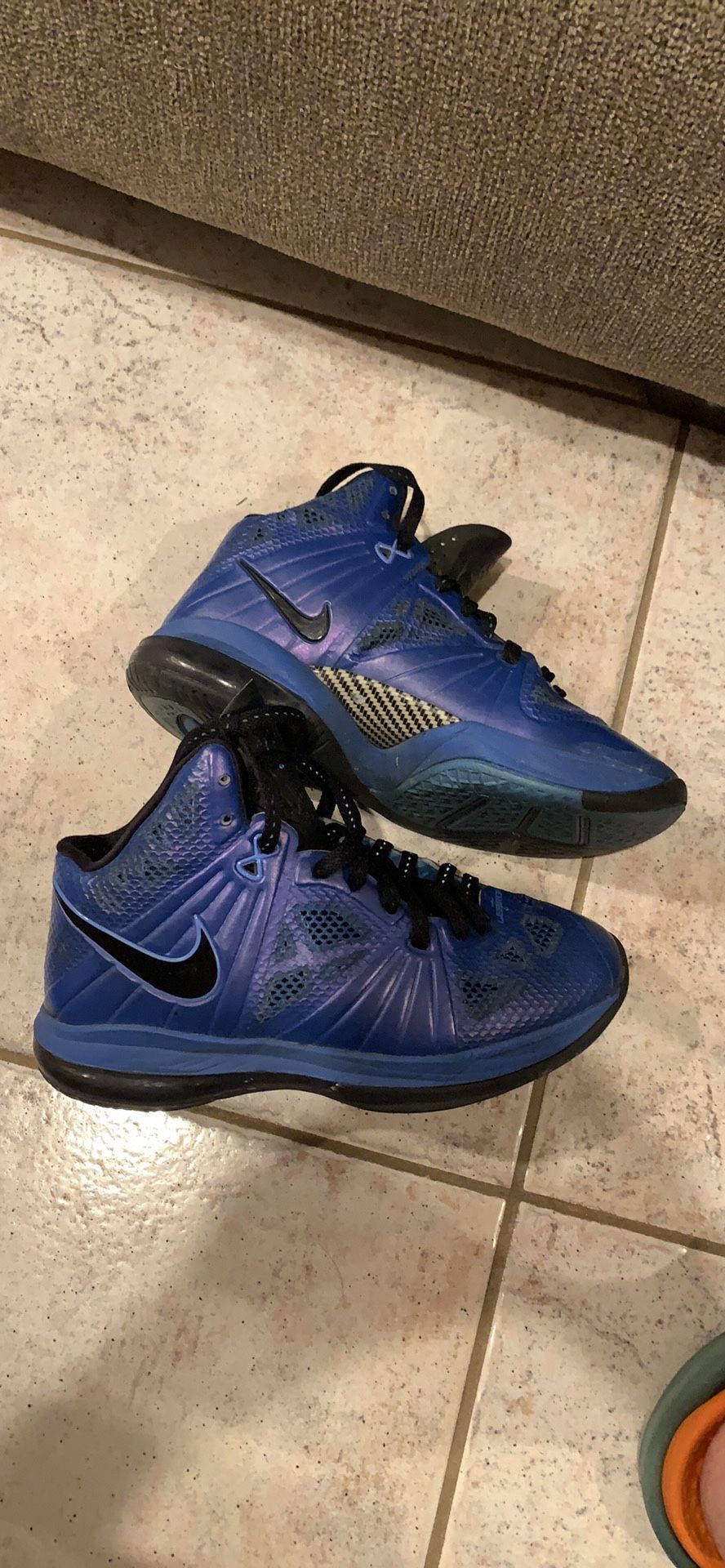 2 pairs Nike lebron James hi top sneakers. Size 6