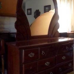 Dresser with mirror attachment and matching headboard