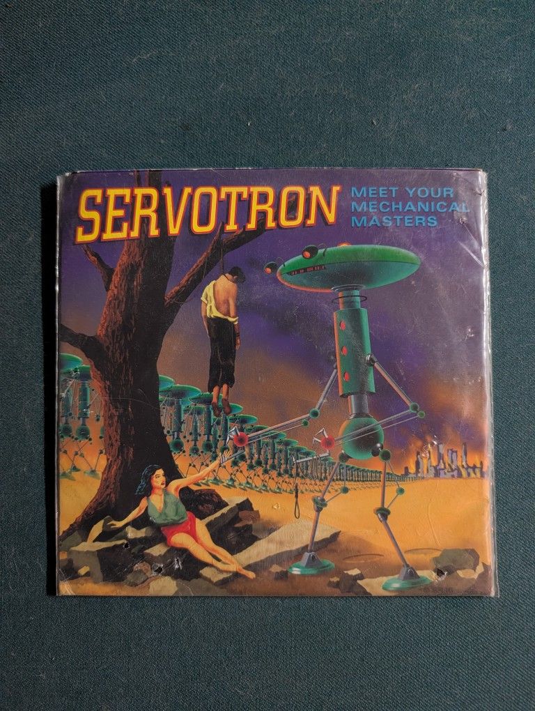 Servotron – Meet Your Mechanical Masters | 7” 45 RPM Picture Sleeve