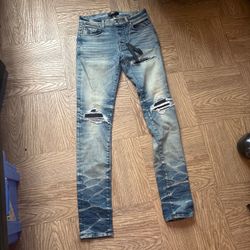 Amiri MX1 Distressed Skinny Jeans