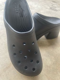 Two pairs of Crocs