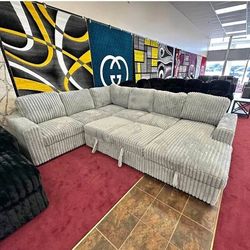 BRAND NEW IN BOX VELVET CORDUROY I SHAPE SECTIONAL WITN STORAGE SPACE. GREY BLACK AVAILABLE $1475!!!