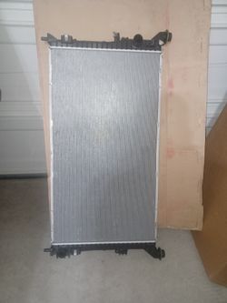 NEW GM RADIATOR FOR SILVERADO 2.7 ENGINE