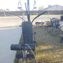 Bowflex older generation with leg attachment and row attachment