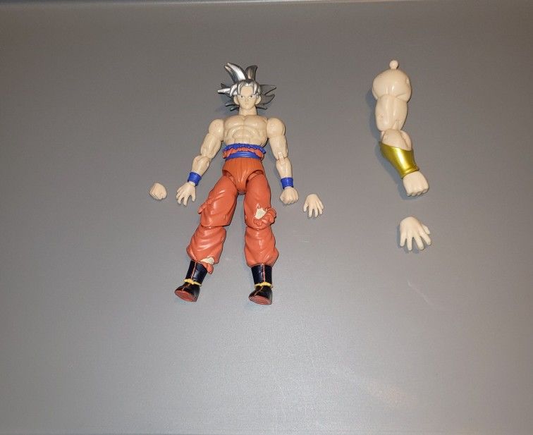 Goku Ui ( Broly Arm Included)