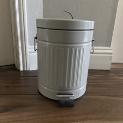 Small metal trash can