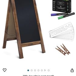 A Frame Chalkboard With Markers And stencils 