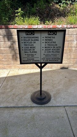 Sign with metal stand.