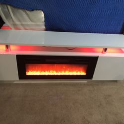 Like new Fireplace/ Tv Stand With remote