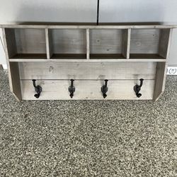 Wall shelf with hooks