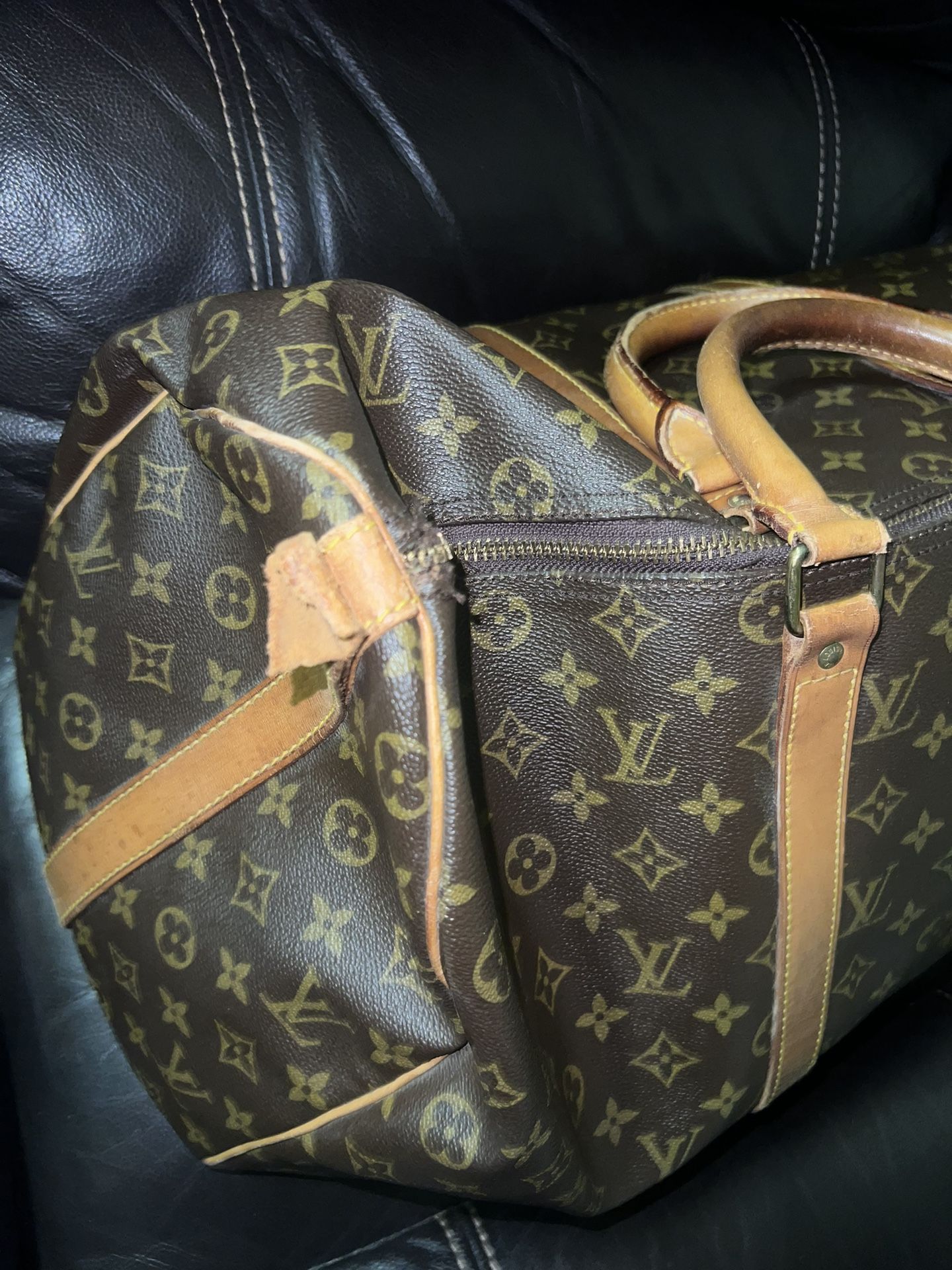 Used Louis Vuitton Duffle Bag $600 in store now