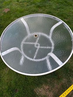 Round glass and metal patio table 42”