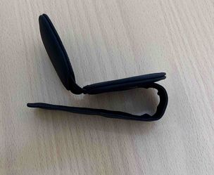I love this clip! New Magnet-Fastened Leather Sunglass Clip For Car Visor (no velcro)
