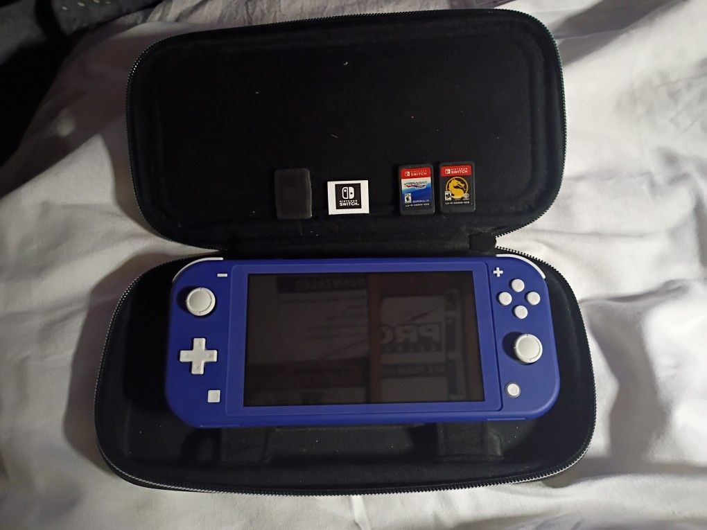 Nintendo Switch Lite With Case Charger And SD Card And 2 Games