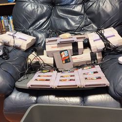 3 Nintendo NES Consoles And 2 Super Nintendo Consoles With 22 Games 