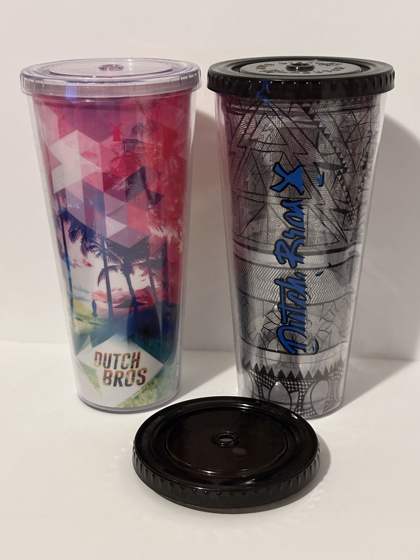 2 Dutch Bros 24 oz plastic travel tumblers - colorful & black/clear