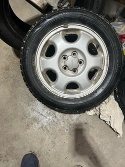 Subaru rims with Excellent Blizzaks
