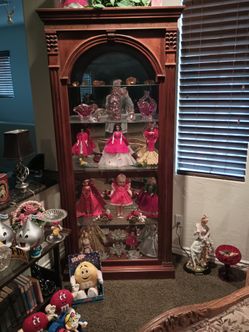 Large curio cabinet wood glass shells, very large woods carved.\nPerfect very heavy and tall
