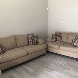 Beige couch and loveseat 