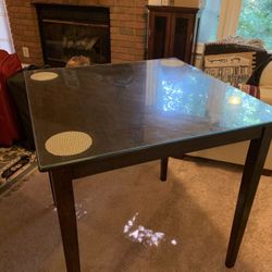 Moving sale dinning table with glass top and 2 chairs