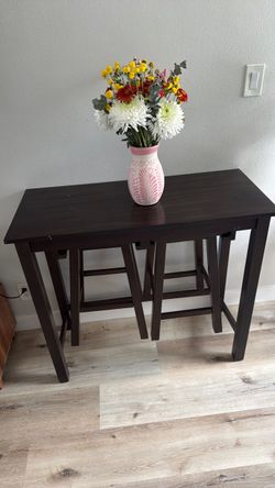Table with two stool chairs