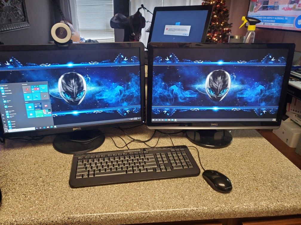 Alienware gaming pc with two 24 inch monitors