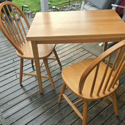 Ikea Table  With 2 Chiars. Opens Up To A Bigger Table 