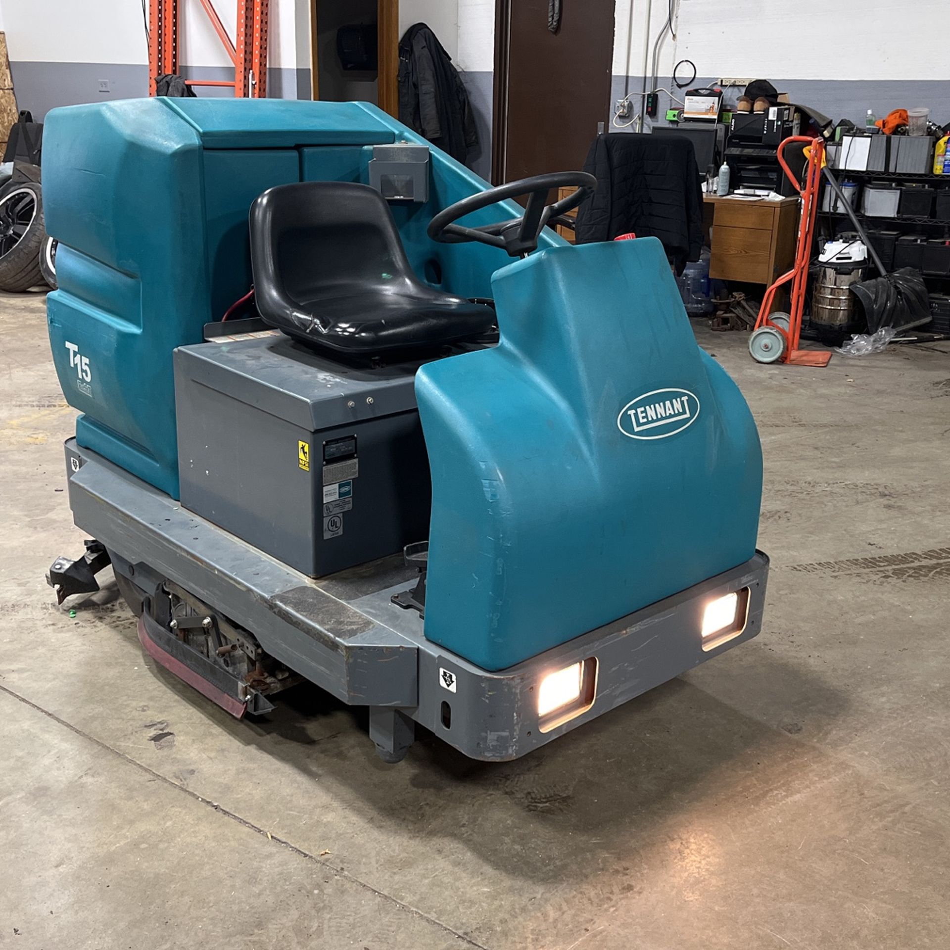 Tennant t3 floor scrubber for warehouse