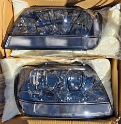 99-04 Jeep Grand Cherokee Headlights Faros Calaveras Micas Luces Lamps Headlamps