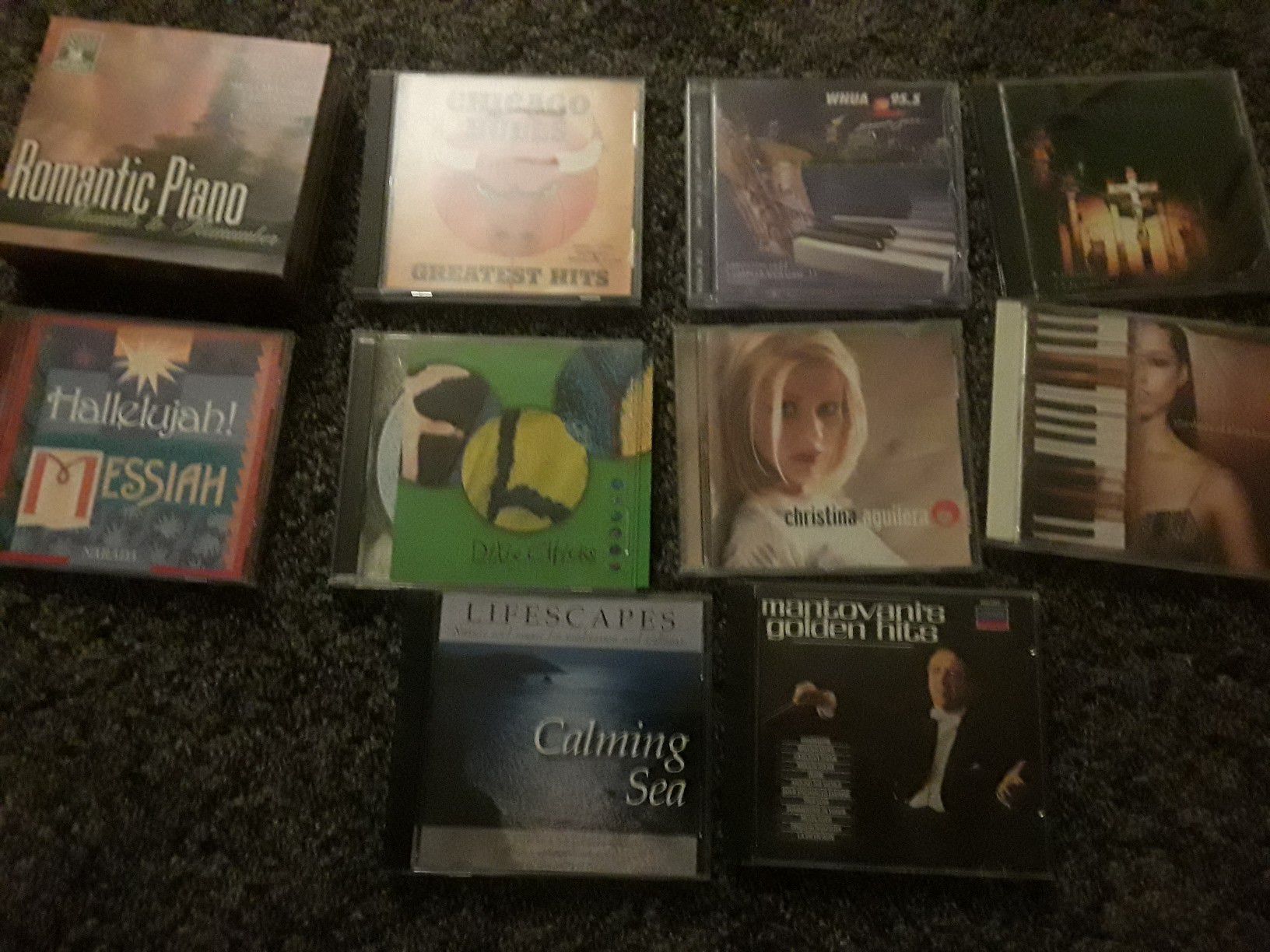 10 CD's including the Dixie Chicks, Chicago Bulls Greatest Hits, Alicia Keys, Christmas music, calming see...