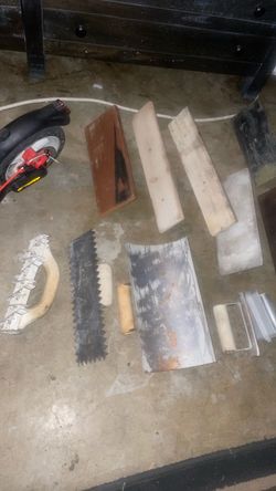 Concrete finishing tools