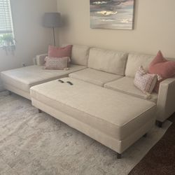Living Spaces Calais Vanilla Couch W/chase and Oversized Ottoman. 