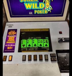 Jokers Wild Video Poker Machine 25 cents Dispenses Coins.  Works great!
