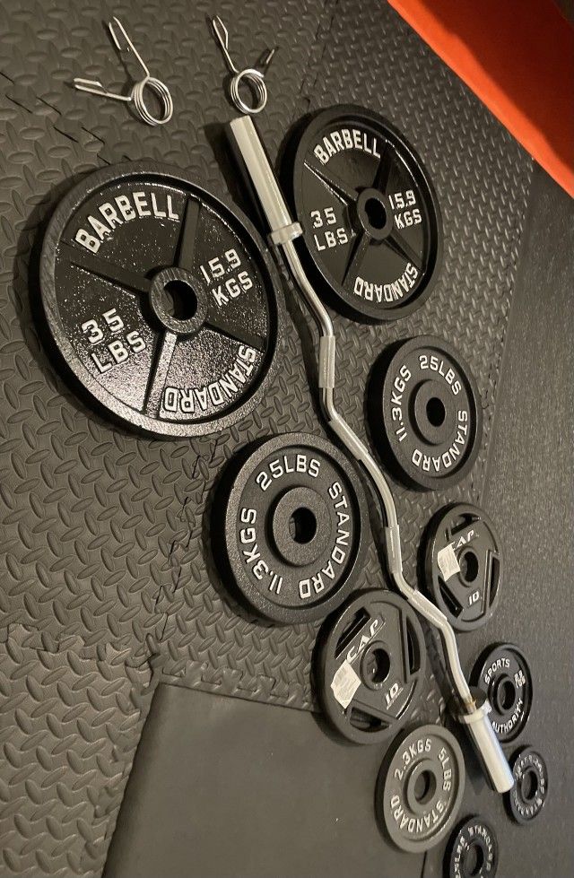 New Curl Bar With Olympic Plates 35#, 25#, 10#, 5# and 2.5# . Brute Wght 175 #