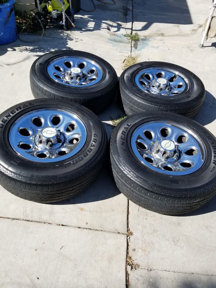 (4)17 inch chevy rims with tires