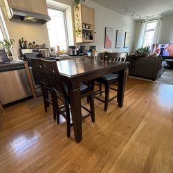 Tall Kitchen table with leaf and 6 chairs