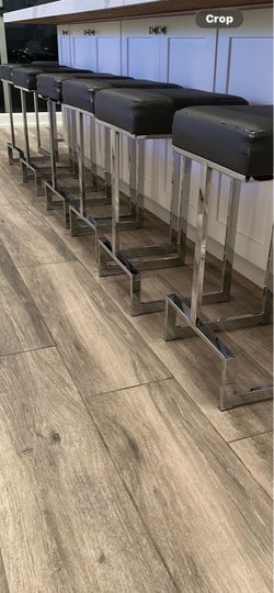 8 counter high chrome stools.