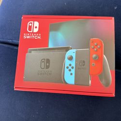 Nintendo Switch 1st Gen 32GB Console Neon Red And Neon Blue. 
