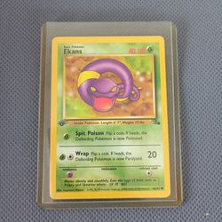 1999 Pokemon Fossil 46 Ekans 1st edition Pokemon card