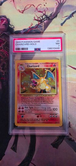 1999 Pokémon Charizard Holo PSA 7 NM