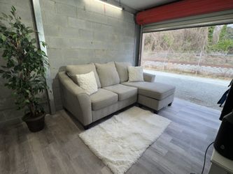 (Delivery) Ashley Furniture Gray Sofa / Couch with Reversible Chaise