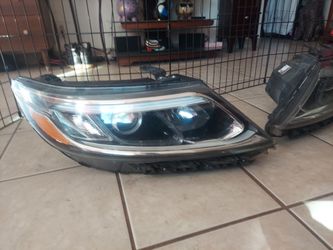 Faros para kia sorento 2014 y 2015