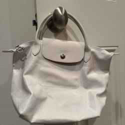 White Leather Handbag with Flap Closure