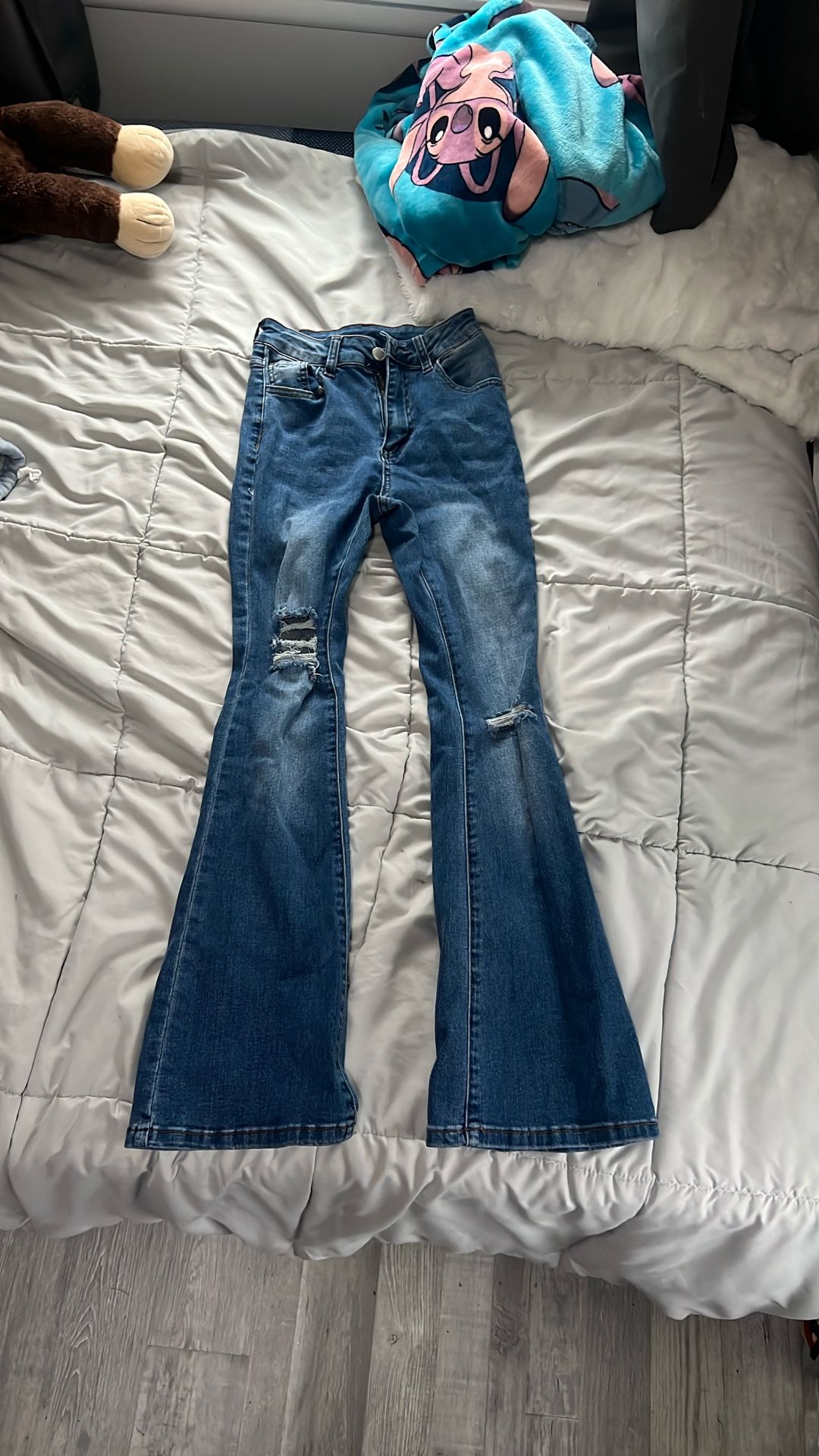ripped bootcut jeans