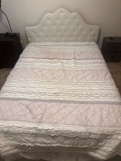 Queen sized bed and mattress