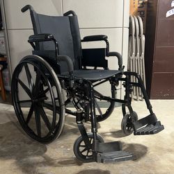 Black Manual Wheelchair with Footrests
