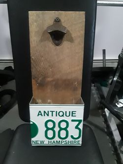 Antique license plate bottle opener catcher