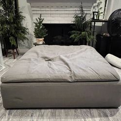 Down Filled Ottoman. 43 Inches X 17 Inches High.