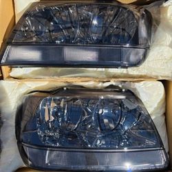99-04 Jeep Grand Cherokee Headlights Luces Calaveras Micas Faros Faroles Headlamps Focos Headlamps 