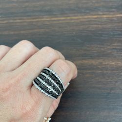 Sterling silver line 25 ring dipped in black gold with cubic zirconia